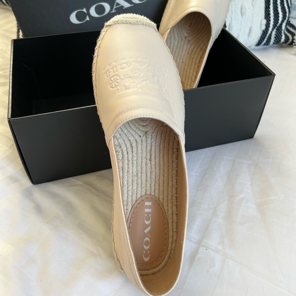 Coach flats. Worn around the house but now too small after baby